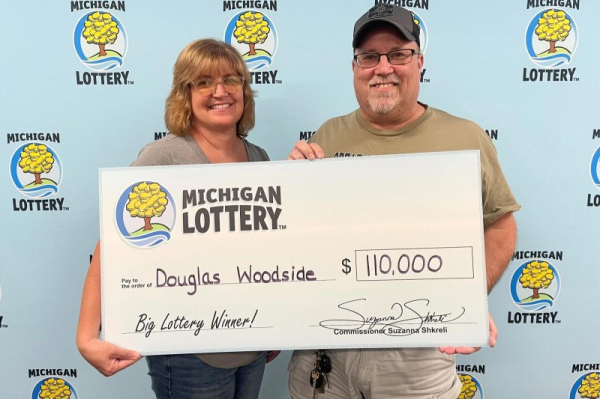 Man wins $110,000 lottery prize while away on vacation Man wins $110,000 lottery prize while away on vacation