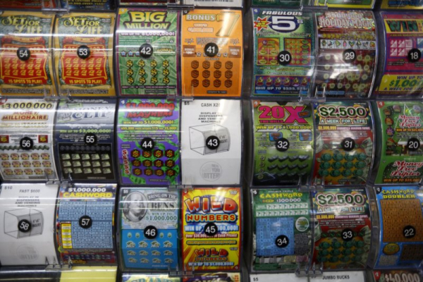 N.C. man collects $1M lottery prize four years after winning $2M
