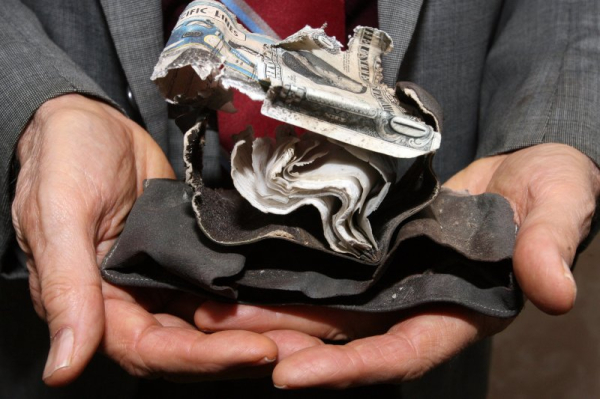 Student's lost wallet found behind school wall 51 years later