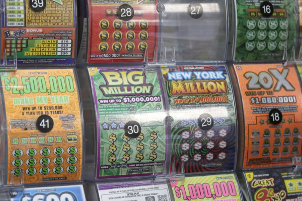 Woman's rare lottery play nets her $100K Woman's rare lottery play nets her $100K