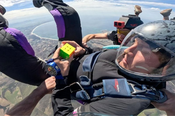 YouTuber breaks Rubik's cube record while skydiving